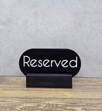 RESERVED SIGN OVAL BLACK W/BASE 90X50MM