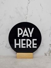 SIGN PAY HERE RND BLACK 150MM W/BASE