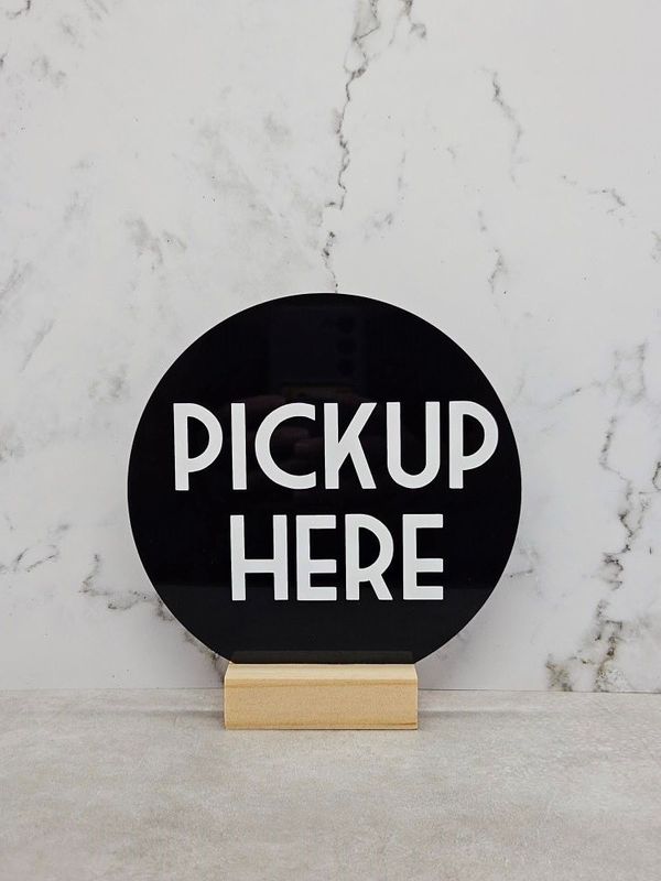 SIGN PICK-UP HERE RND BLACK 150MM W/BASE