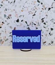 RESERVED SIGN BLUE RECT W/BASE 75X50MM