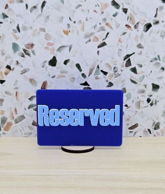 RESERVED SIGN BLUE RECT W/BASE 75X50MM