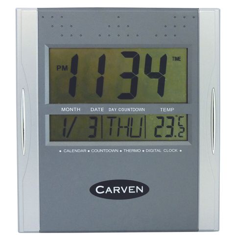 "CLOCK DIGITAL CARVEN  SILVER INCLUDES: MONTH, DATE& DAY"