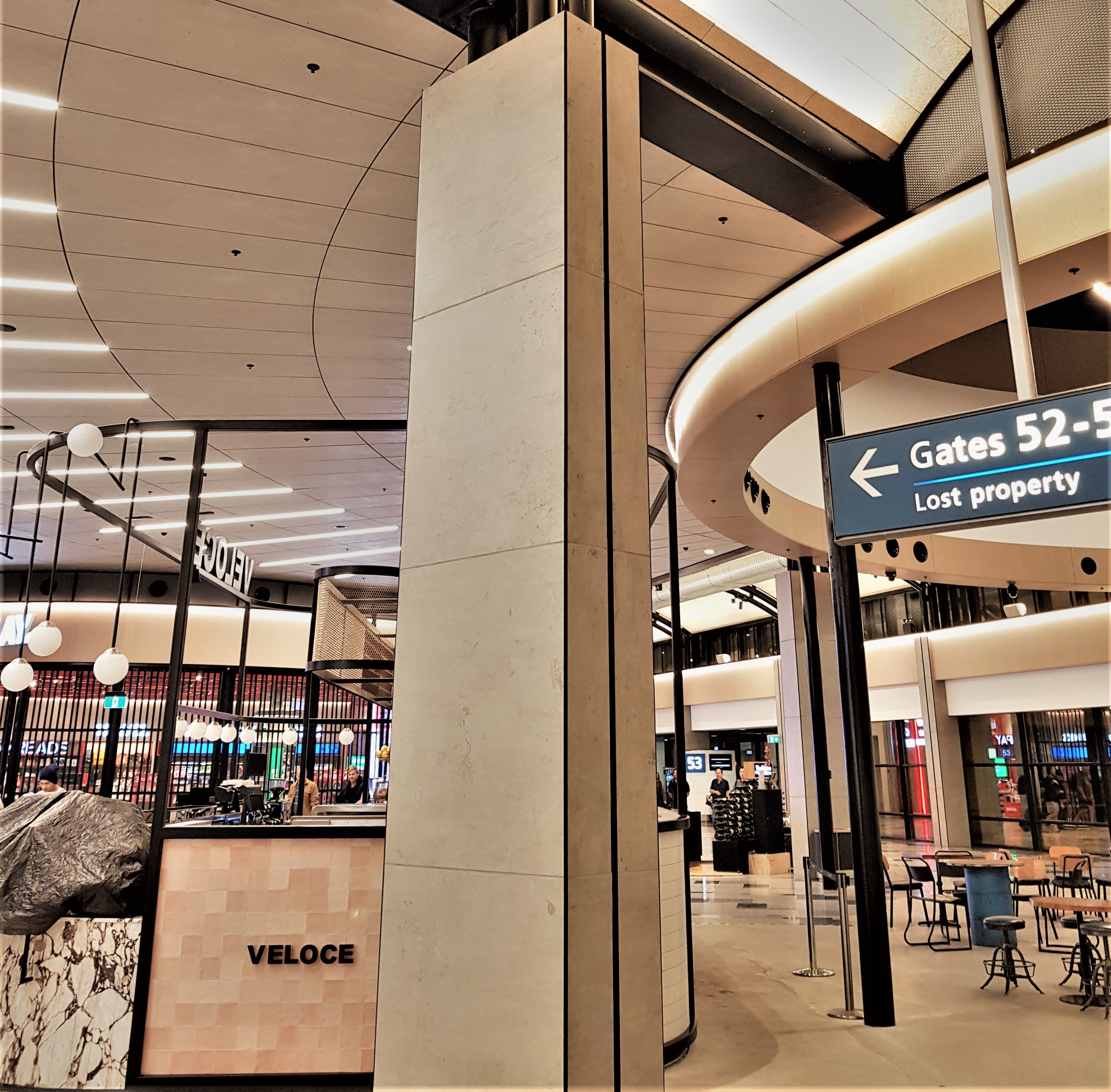 Birdsmouth tile trims by Amark Group at Sydney T2 Terminal