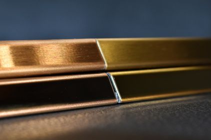 The difference between natural brass and PVD coated stainless steel gold trims