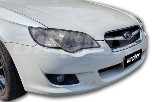 HEADLIGHT GUARDS - LIGHT TINT - PAIR