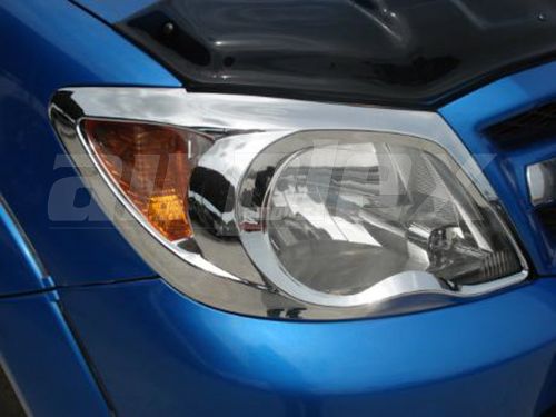 HEADLIGHT TRIM SET CHROME HILUX