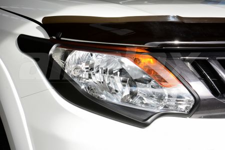 HEADLIGHT TRIM SET BLACK TRITON