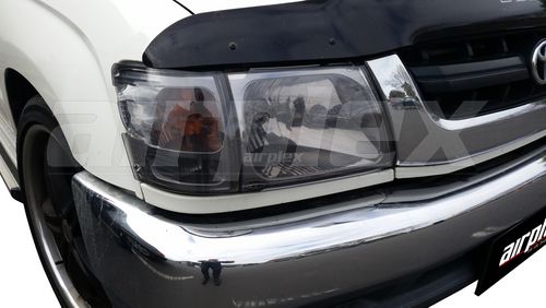 HEADLIGHT GUARDS - LIGHT TINT - PAIR (4WD ONLY)