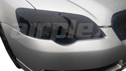 HEADLIGHT GUARD - DARK TINT - PAIR