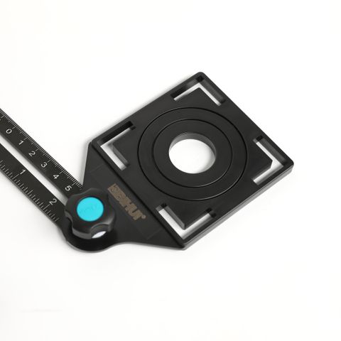 MULTI-FUNCTIONAL ADJUSTABLE TILE HOLE LOCATOR