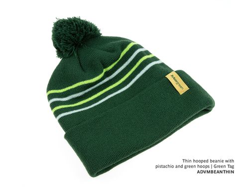 Thin hooped beanie with pistachio and green hoops. Gold Tag.