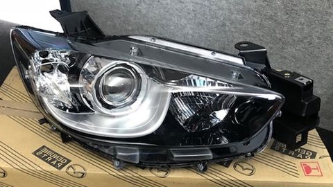 HEADLAMP - RH BI XENON GENUINE