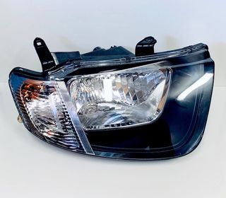 HEADLAMP - RH GL & GLX RH GENUINE - WITH CLEAR INDICATOR