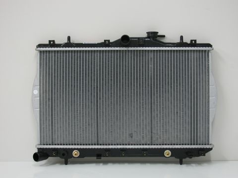 RADIATOR - AUTO W/SENDER PORT BOTTOM TANK L/H