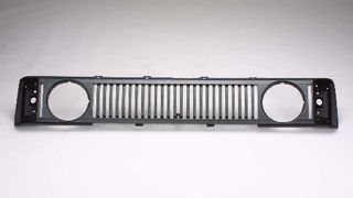 GRILLE - ROUND HEADLAMP