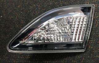 GARNISH - BOOTLID LAMP SDN R/H GENUINE