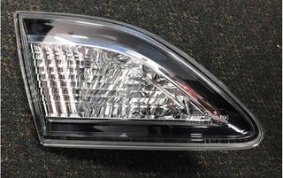 GARNISH - BOOTLID LAMP SDN L/H GENUINE