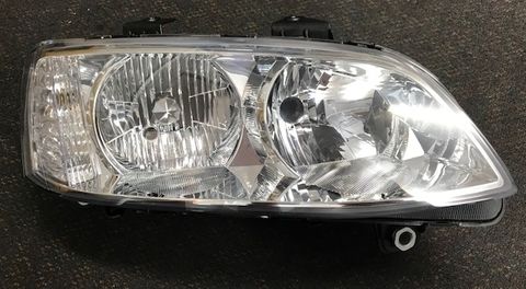 HEADLAMP - RH LATE OMEGA BERLINA CHROME