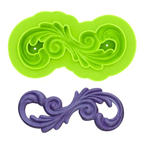SCROLL WING MOULD