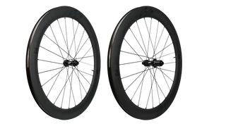 `A NEW ITEM - Wheelset CARBON 700c Novatec R6 Disc Centerlock (21mm inner width, 60mm deep rims). Tubeless Ready R: 142 x 12mm Thru. F: 100 x 12mm Thru