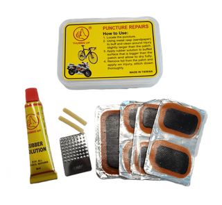 Puncture Repair Kit - 7 Patches, Rubber Solution, Valve Rubber & Metal Grater