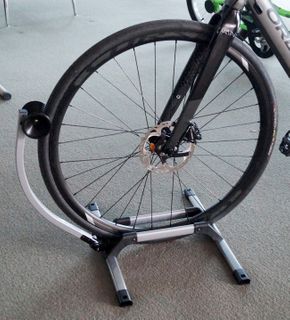 DISPLAYor PARKING  STAND for 20" to 29ER Bikes, Suits Road, BMX or MTB Tyres (Max Tyre Width 6.5cm) Great for Disc Brakes, Spring arm holds Front or Rear Wheel, Holds 1 Bike, Silver/Black