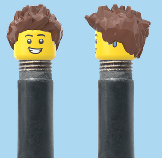 `A NEW ITEM  -  VALVE CAP, A/V, open mouth smile, messy brown hair, sold in pairs