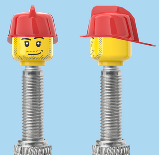 `A NEW ITEM  -  VALVE CAP, F/V, spotty beard, fire fighter helmet, sold in pairs
