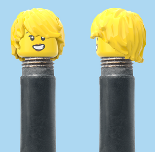 `A NEW ITEM  -  VALVE CAP, A/V, grinding smile, eyelashes, yellow hair, sold in pairs