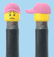 `A NEW ITEM  -  VALVE CAP, A/V, open mouth smile & sad tear face, pink hat, sold in pairs