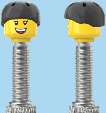 `A NEW ITEM  -  Brick Caps - Presta Valve - 2 Face Head with Freckles & Lipstick (Open Mouth Smile & Closed Eye Smile) with a Black Helmet