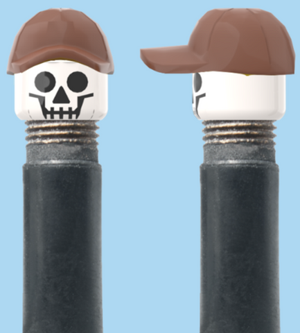 `A NEW ITEM  -  Brick Caps - Schrader Valve - 1 Face Head (SKULL) with a Brown Cap