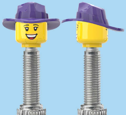 `A NEW ITEM  -  Brick Caps - Presta Valve - 2 Face Head with Freckles & Lipstick (Open Mouth Smile & Closed Eye Smile) with a Purple Cowgirl Hat