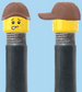 `A NEW ITEM  -  Brick Caps - Schrader Valve - 2 Face Head (Freckles Smile & Freckles Worried Look) with a Brown Cap