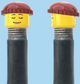 `A NEW ITEM  -  Brick Caps - Schrader Valve - 2 Face Head with Freckles & Lipstick (Open Mouth Smile & Closed Eye Smile) with a Brown Beanie