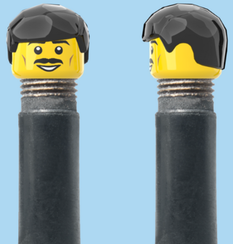 `A NEW ITEM  -  Brick Caps - Schrader Valve - 1 Face Head (Moustache Smile) with a Black Fringe Hairdo