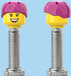 `A NEW ITEM  -  Brick Caps - Presta Valve - 2 Face Head with Freckles & Lipstick (Open Mouth Smile & Closed Eye Smile) with a Pink Helmet