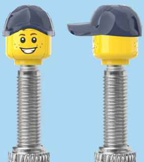 `A NEW ITEM  -  Brick Caps - Presta Valve - 2 Face Head (Freckles Smile & Freckles Worried Look) with a Blue Cap