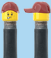 `A NEW ITEM  -  Brick Caps - Schrader Valve - 2 Face Head (Freckles Smile & Freckles Worried Look) with a Red Cap