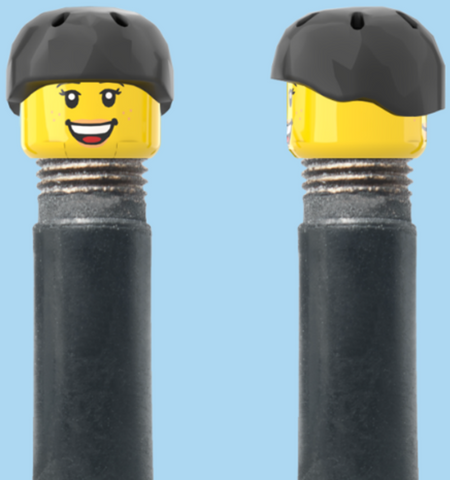 `A NEW ITEM  -  Brick Caps - Schrader Valve - 2 Face Head with Freckles & Lipstick (Open Mouth Smile & Closed Eye Smile) with a Black Helmet