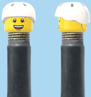 `A NEW ITEM  -  Brick Caps - Schrader Valve - 2 Face Head (Bursting Cheeks & Wrinkle Eye Smile) with a Helmet White
