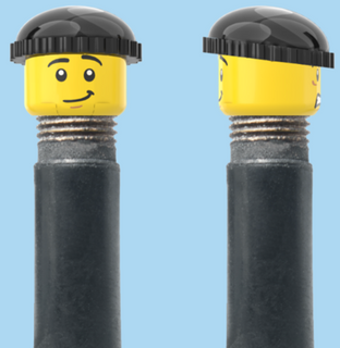 `A NEW ITEM  -  Brick Caps - Schrader Valve - 2 Face Head (Worried Look & Half Smile) with a Black Beanie