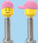 `A NEW ITEM  -  Brick Caps - Presta Valve - 2 Face Head with Freckles & Lipstick (Open Mouth Smile & Closed Eye Smile) with a Pink Cap