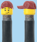 `A NEW ITEM  -  Brick Caps - Schrader Valve - 2 Face Head (Worried Look & Half Smile) with a Red Cap