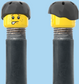 `A NEW ITEM  -  Brick Caps - Schrader Valve - 2 Face Head (Freckles Smile & Freckles Worried Look) with a Black Helmet