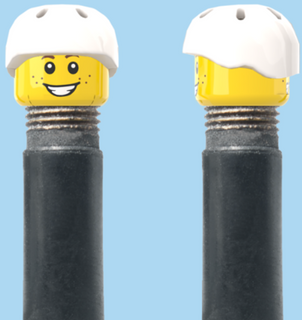 `A NEW ITEM  -  Brick Caps - Schrader Valve - 2 Face Head (Freckles Smile & Freckles Worried Look) with a Helmet White