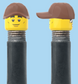 `A NEW ITEM  -  Brick Caps - Schrader Valve - 2 Face Head (Sunglasses with Cheesy Smile & Normal Smile Face) with a Brown Cap