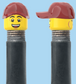 `A NEW ITEM  -  Brick Caps - Schrader Valve - 2 Face Head (Bursting Cheeks & Wrinkle Eye Smile) with a Red Cap