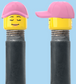 `A NEW ITEM  -  Brick Caps - Schrader Valve - 2 Face Head with Freckles & Lipstick (Open Mouth Smile & Closed Eye Smile) with a Pink Cap