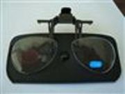 CLIP-ON SPECTACLE MAGNIFIERS